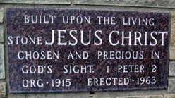 The cornerstone, inscribed with the verse from 1 Peter 2 and the dates Org. 1915 and Erected 1963